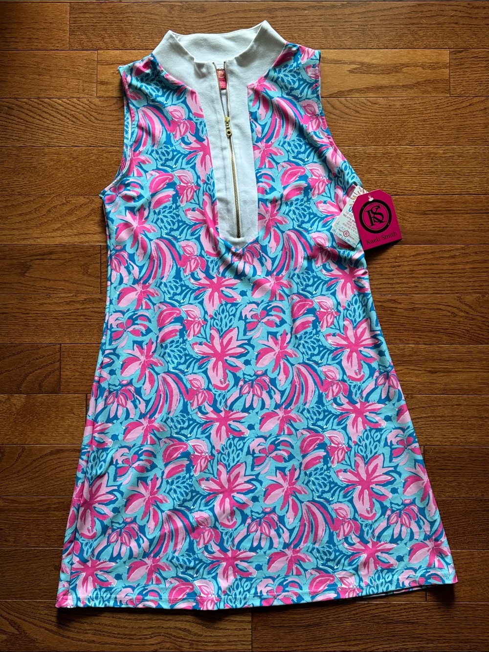 Kaeli Smith Pink & Gold Logo Label Polo Top